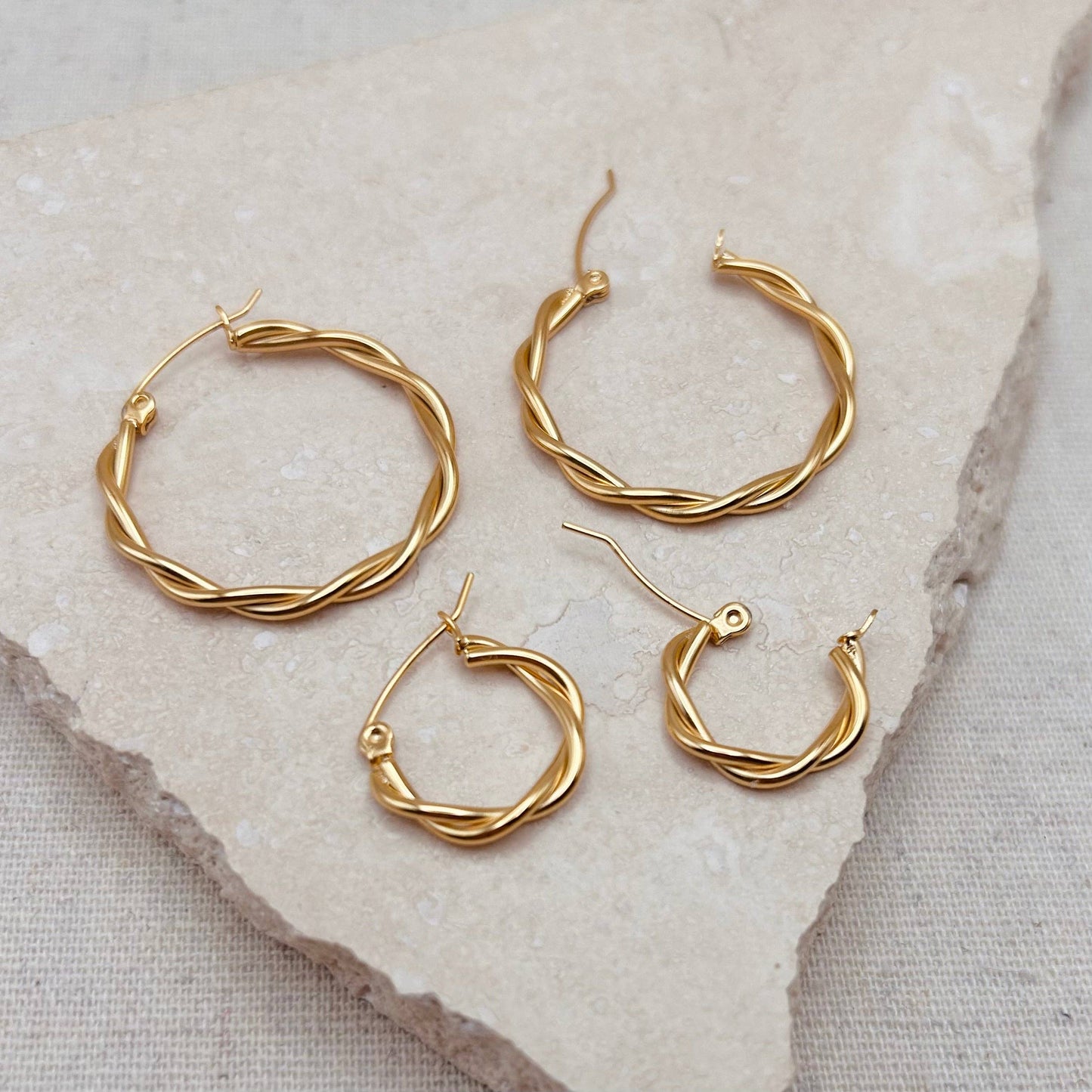 Close up of 31mm twisted gold hoop earring