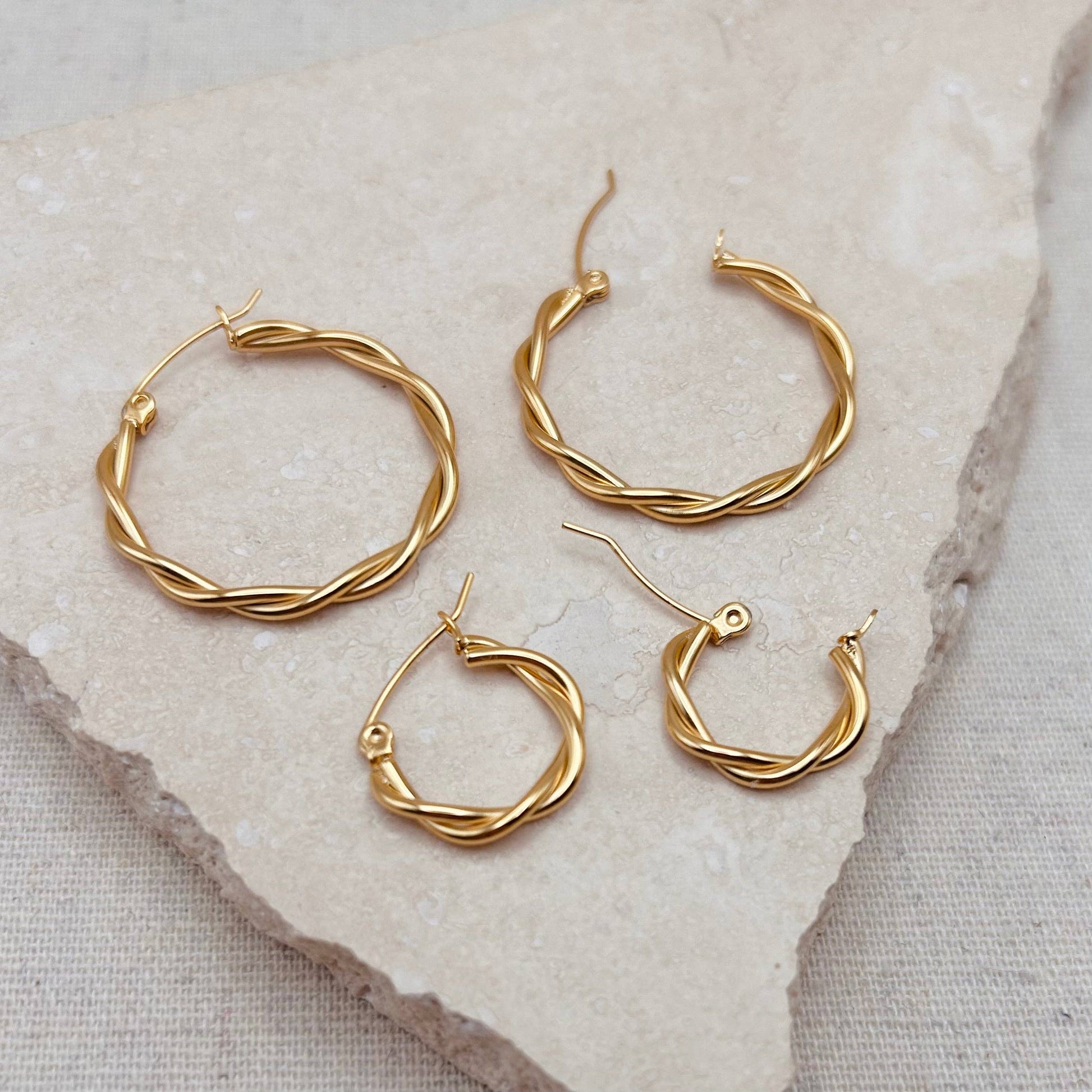 Close up of 31mm twisted gold hoop earring