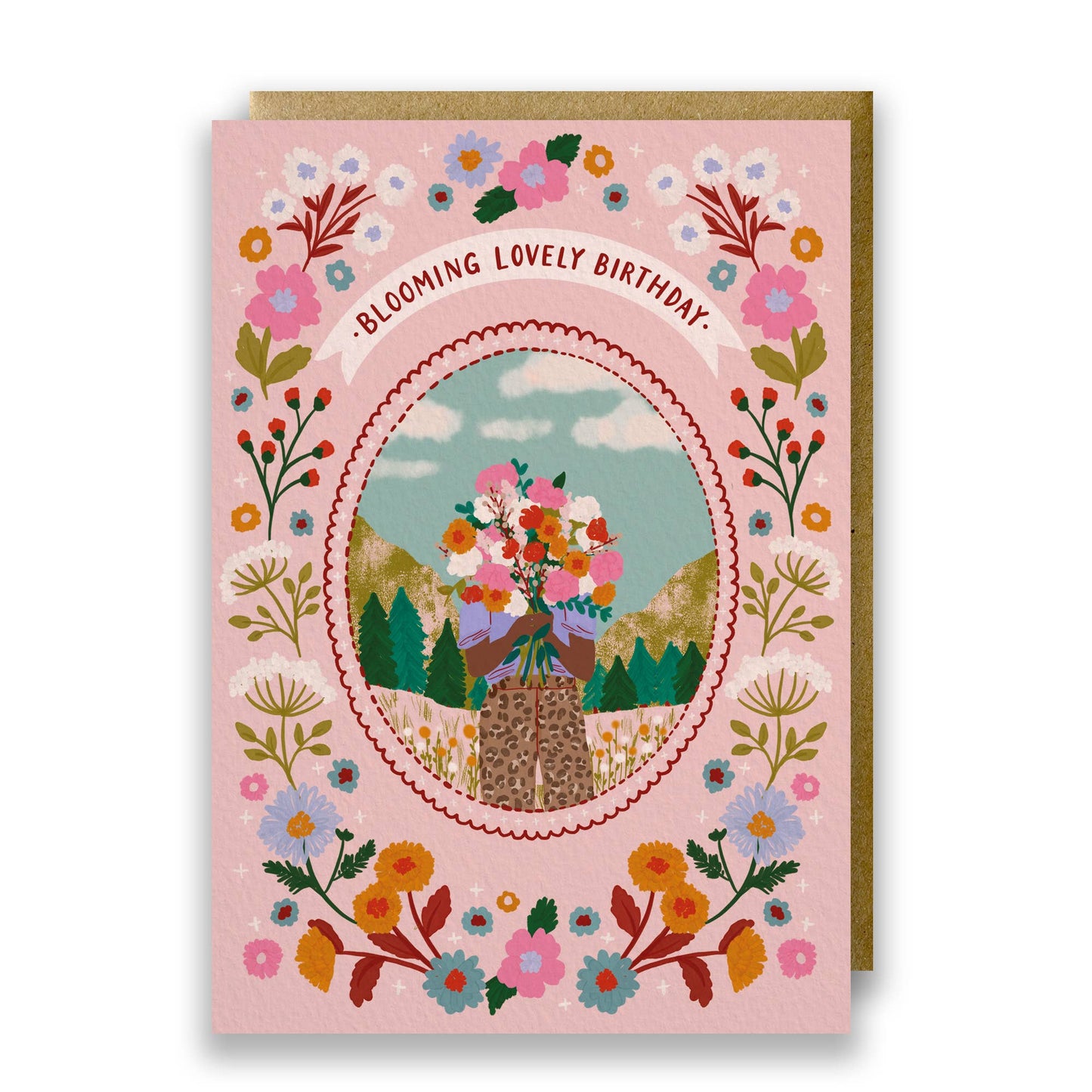 Blooming Lovely Birthday Card featuring a woman with a floral bouquet in a mountain scene