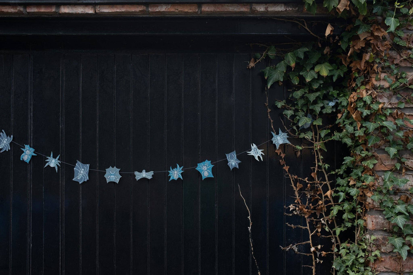 Hand-sewn recycled Halloween garland with 20 spooky screen-printed spiders
