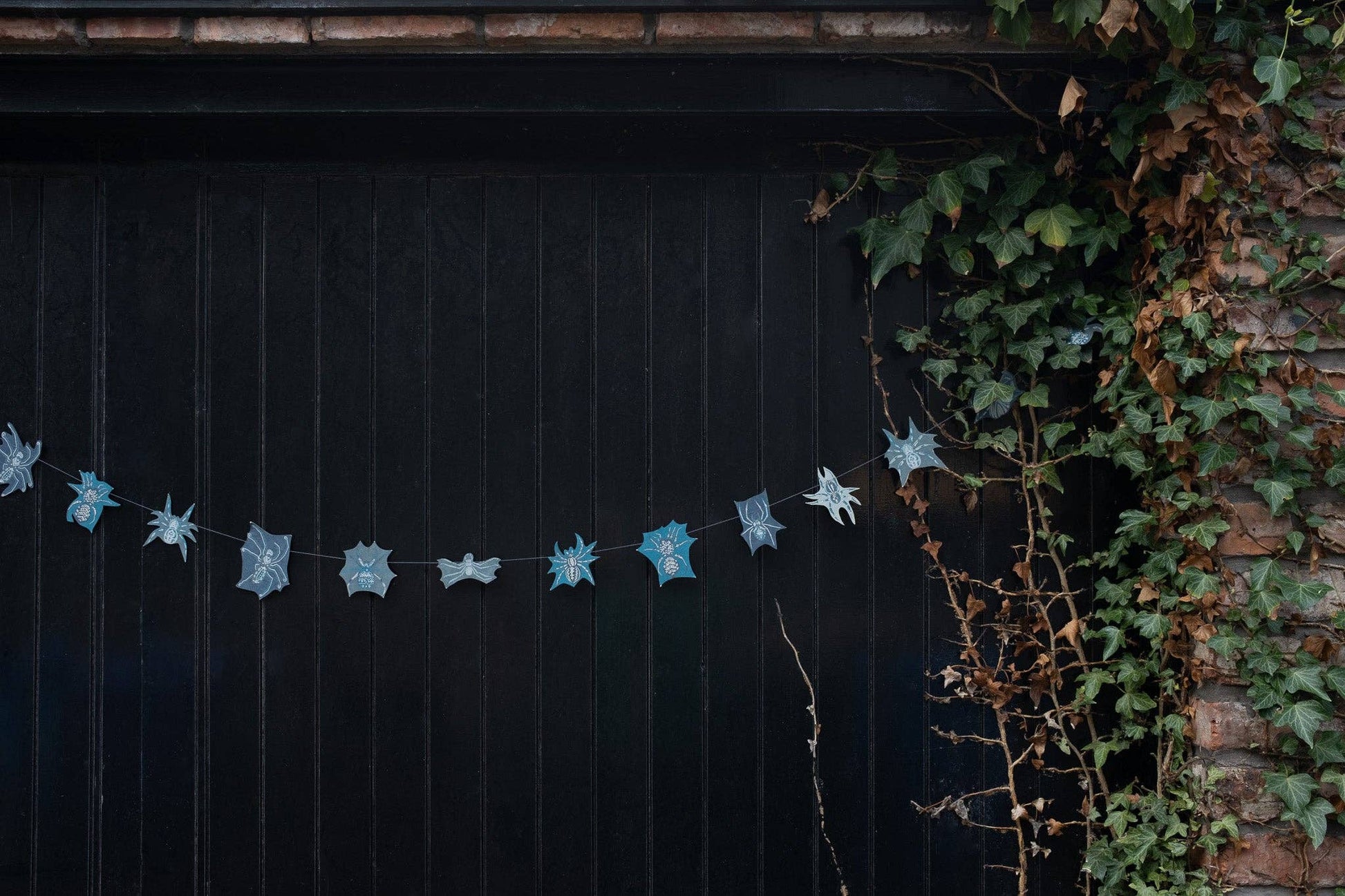 Hand-sewn recycled Halloween garland with 20 spooky screen-printed spiders
