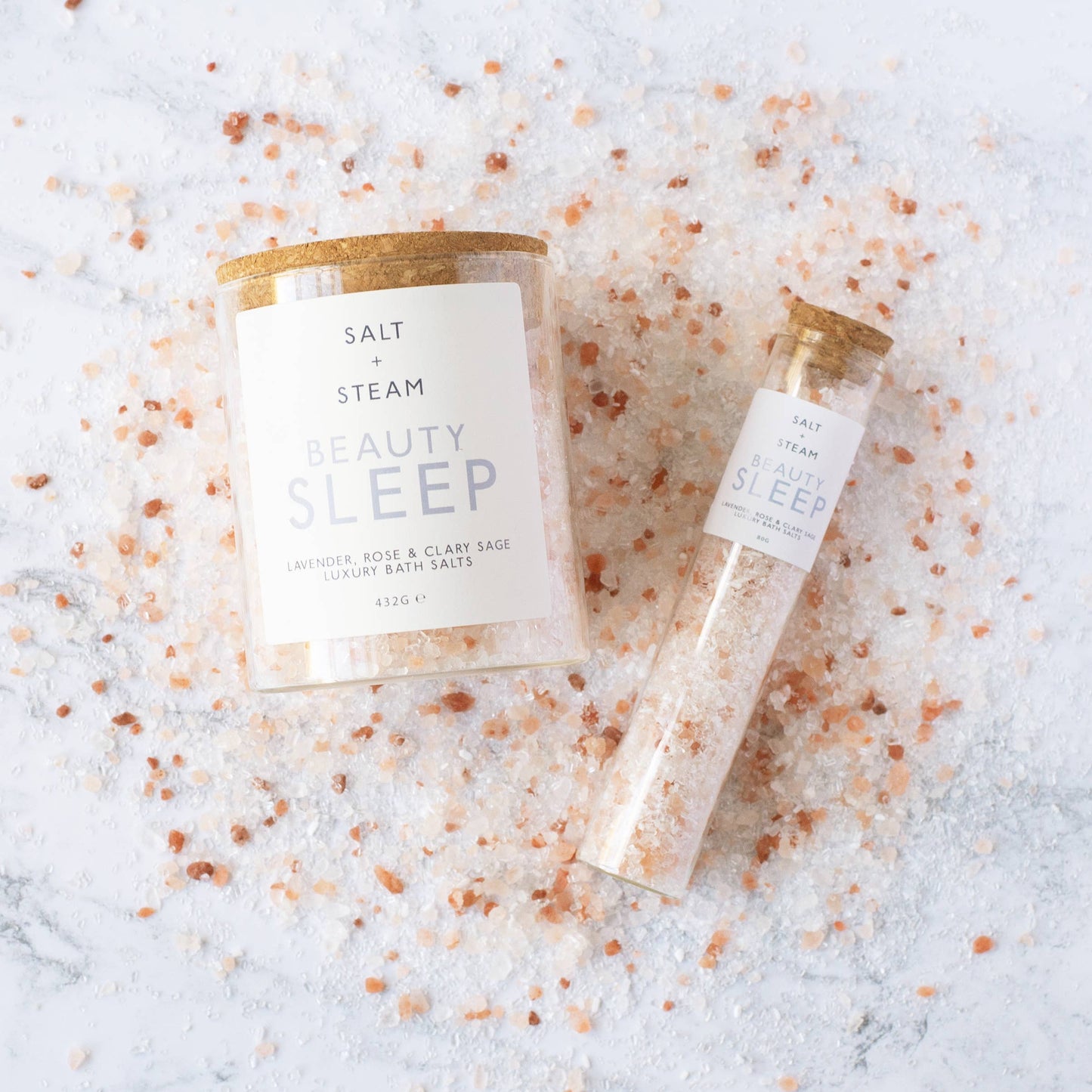Beauty Sleep Lavender Rose and Clary Sage bath salts in glass jar.