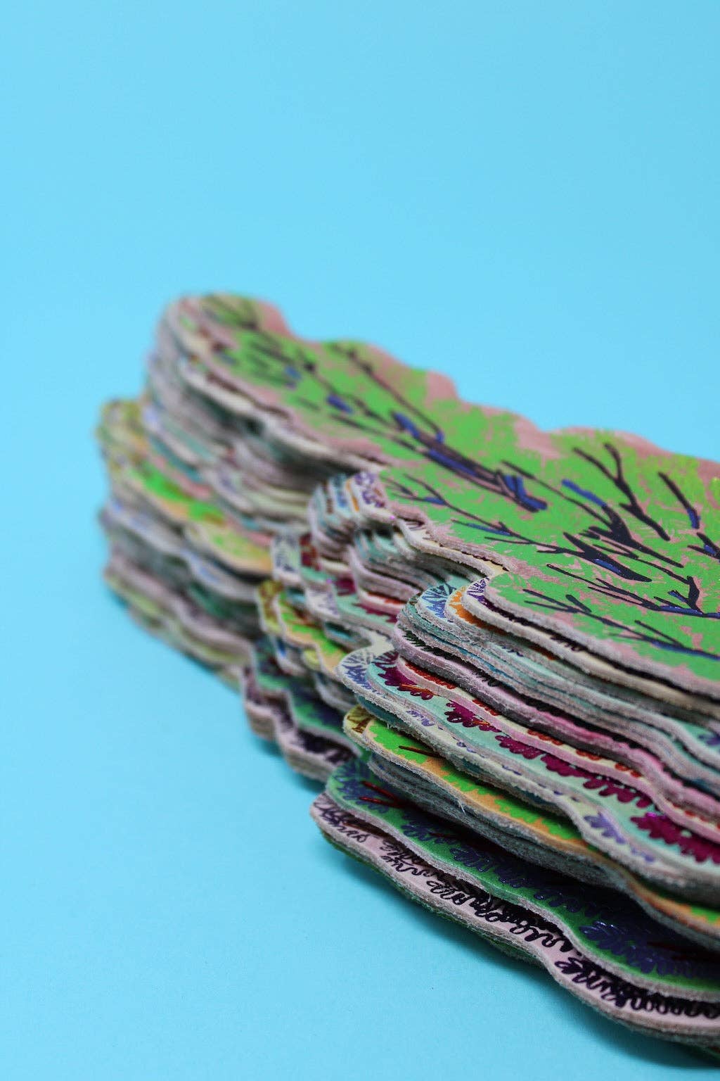 Unique hand-painted backgrounds on British made leather bookmarks