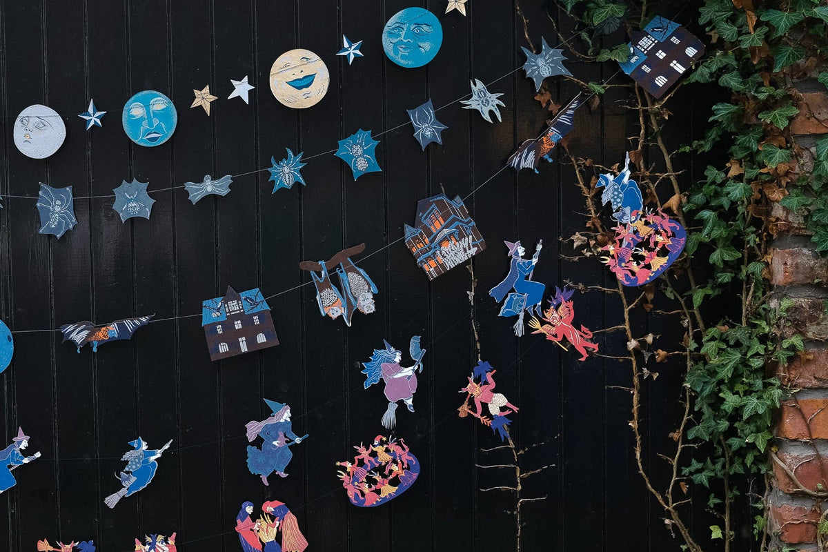 Detail of strong cotton thread on hand-sewn garland