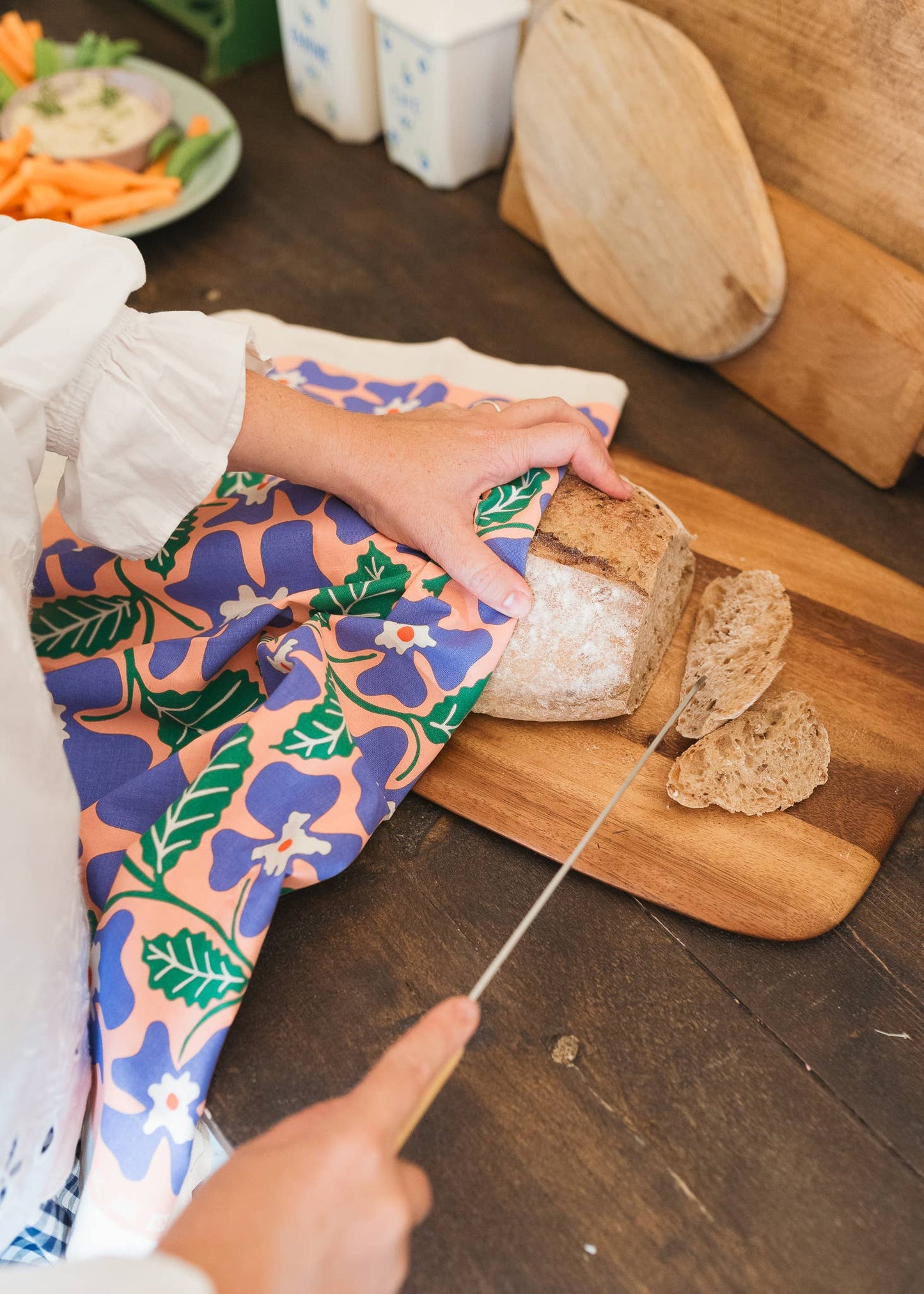 Primrose tea towel with floral screenprint on unbleached natural cotton by Studio Wald.