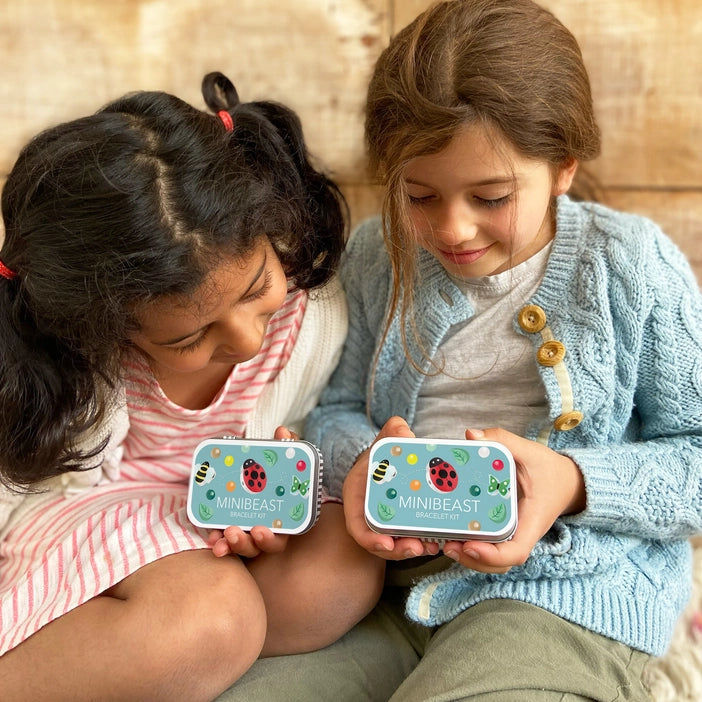 A gift tin containing elastic and beads to create this minibeast bracelet. The elastic comes with hard ends to aid the beading process for young children. Then, patience and precision are all that's required to assemble this piece. The tin can be used to store the bracelet, or a special trinket
