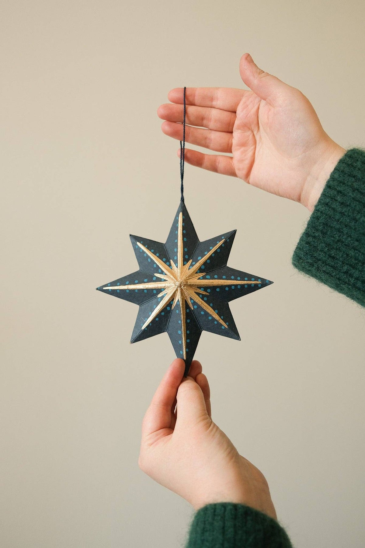Detail of artisan screen-printed Twinkling Star ornament