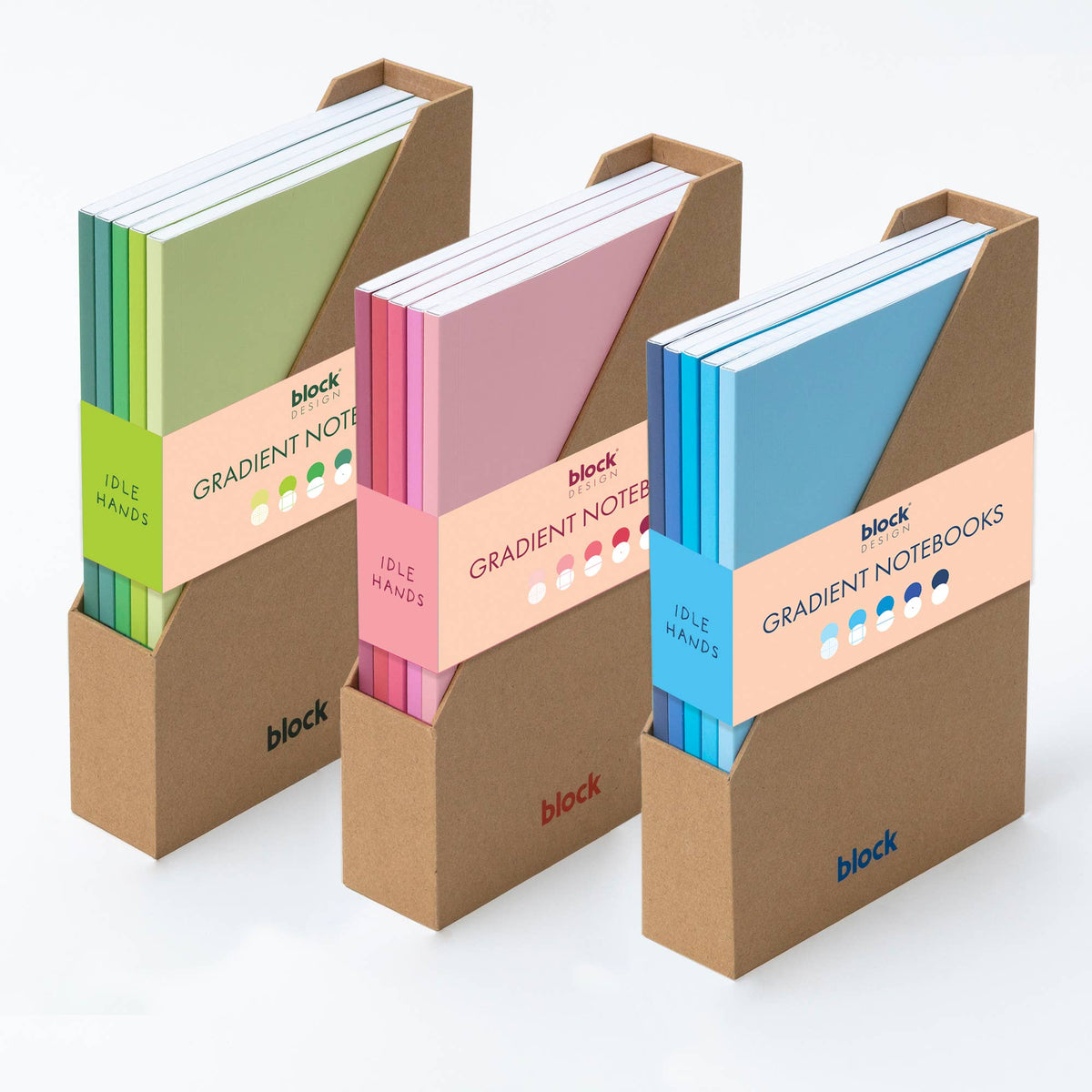 Overhead view of five gradient notebooks laid flat on desk