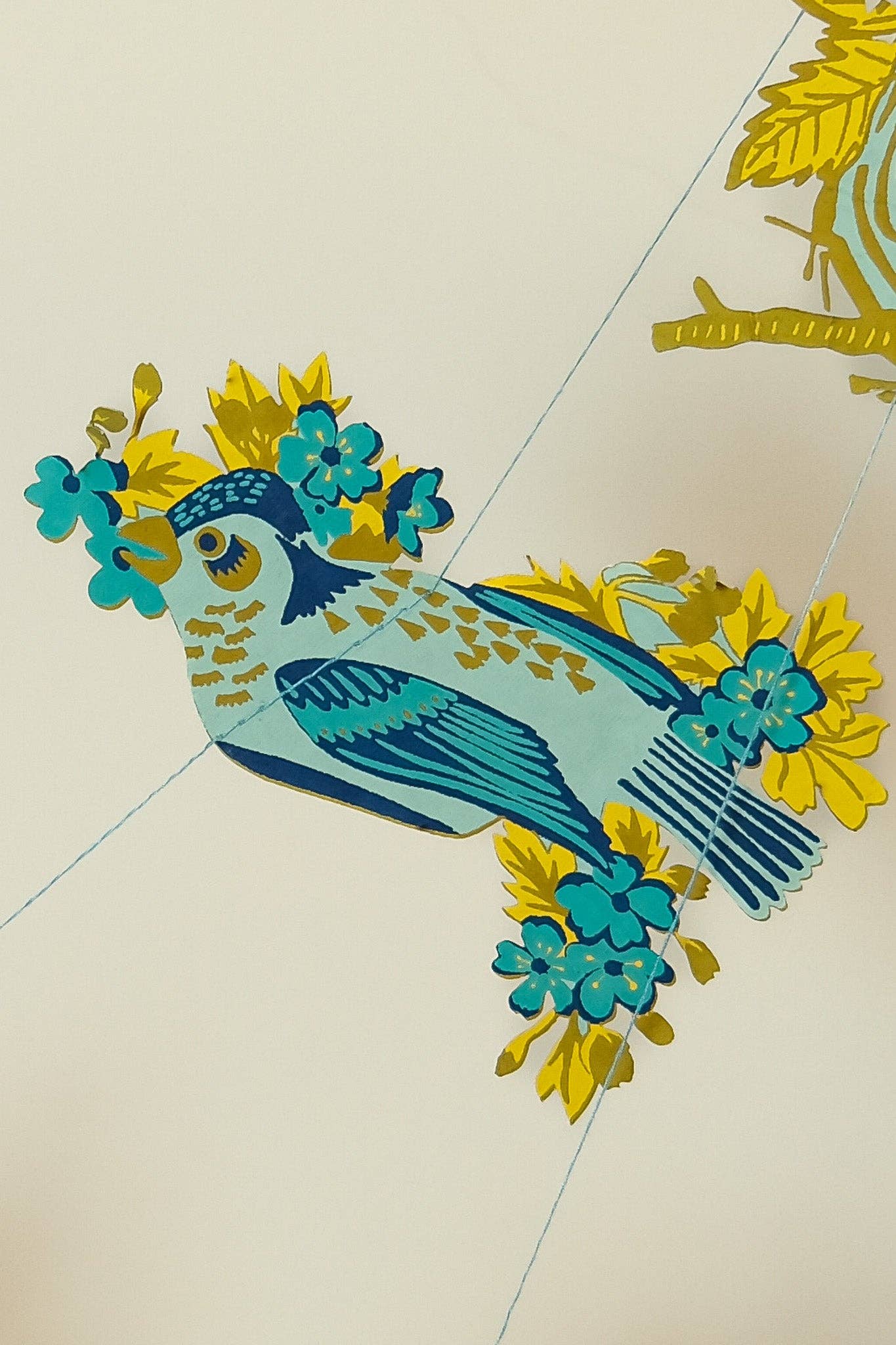 Recycled paper garland with bird nest design