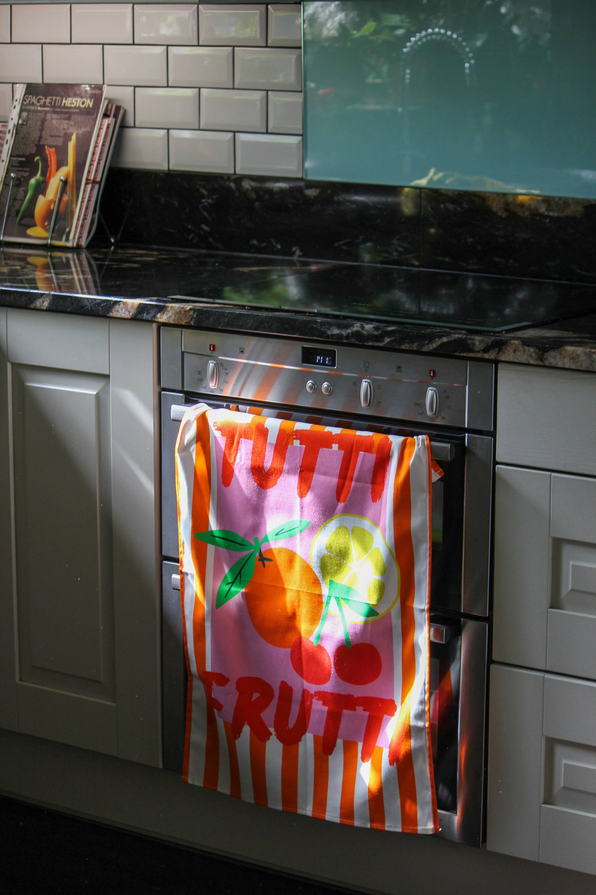 Sustainable cotton tea towel featuring cherries and citrus