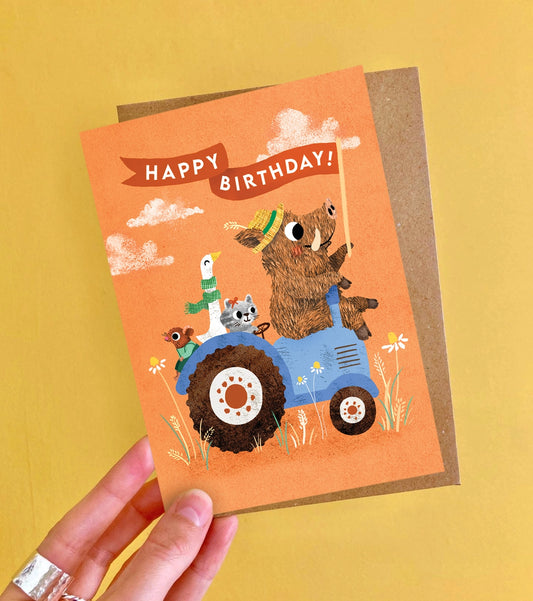 Vibrant birthday card featuring a colourful tractor illustration by Emily Nash.