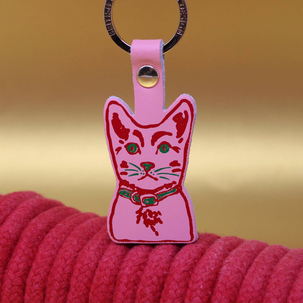 Tabby cat leather keyring display with accessories