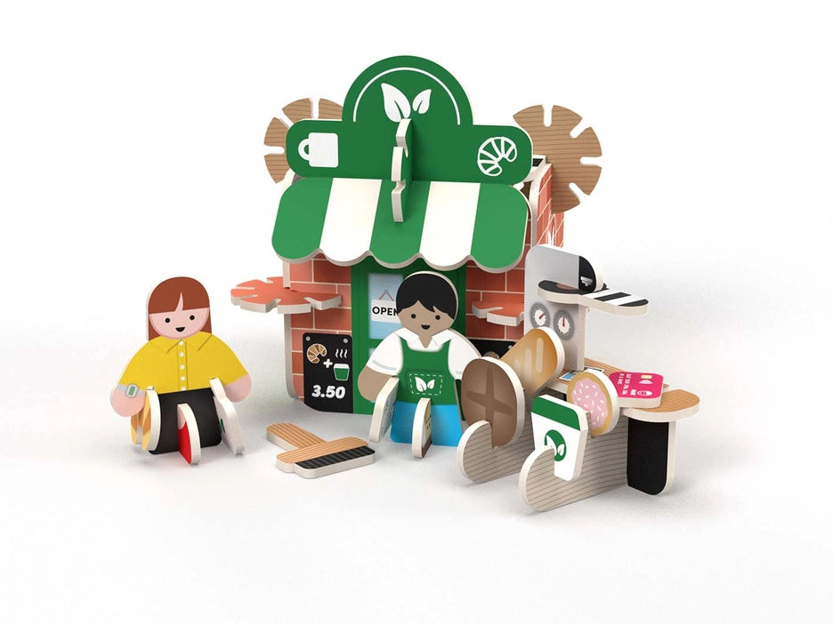 Playpress Mini Refill Café Playset is pocket-sized and wonderful for inspiring imaginative play. With this pack, you’ll be able to build a mini café and assemble a variety of accessories, including miniature food items, a coffee machine, and cash. A shop assistant and customer are also included. Made from our sustainable sourced FSC® (FSC-C004309) certified Playboard, this playset is not only environmentally friendly, but also durable and long-lasting.
