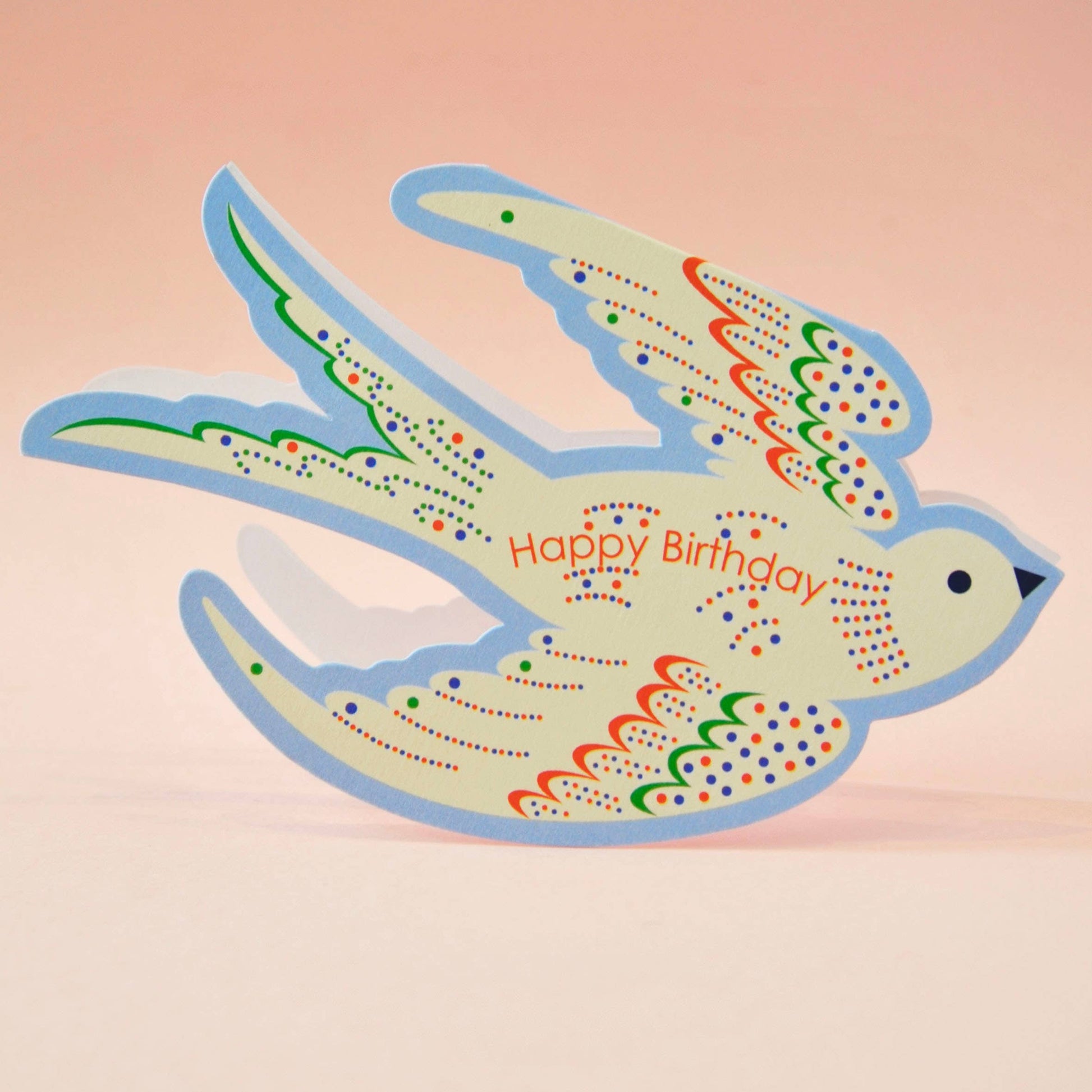 Close-up of a blue rocking bird birthday card, UK made