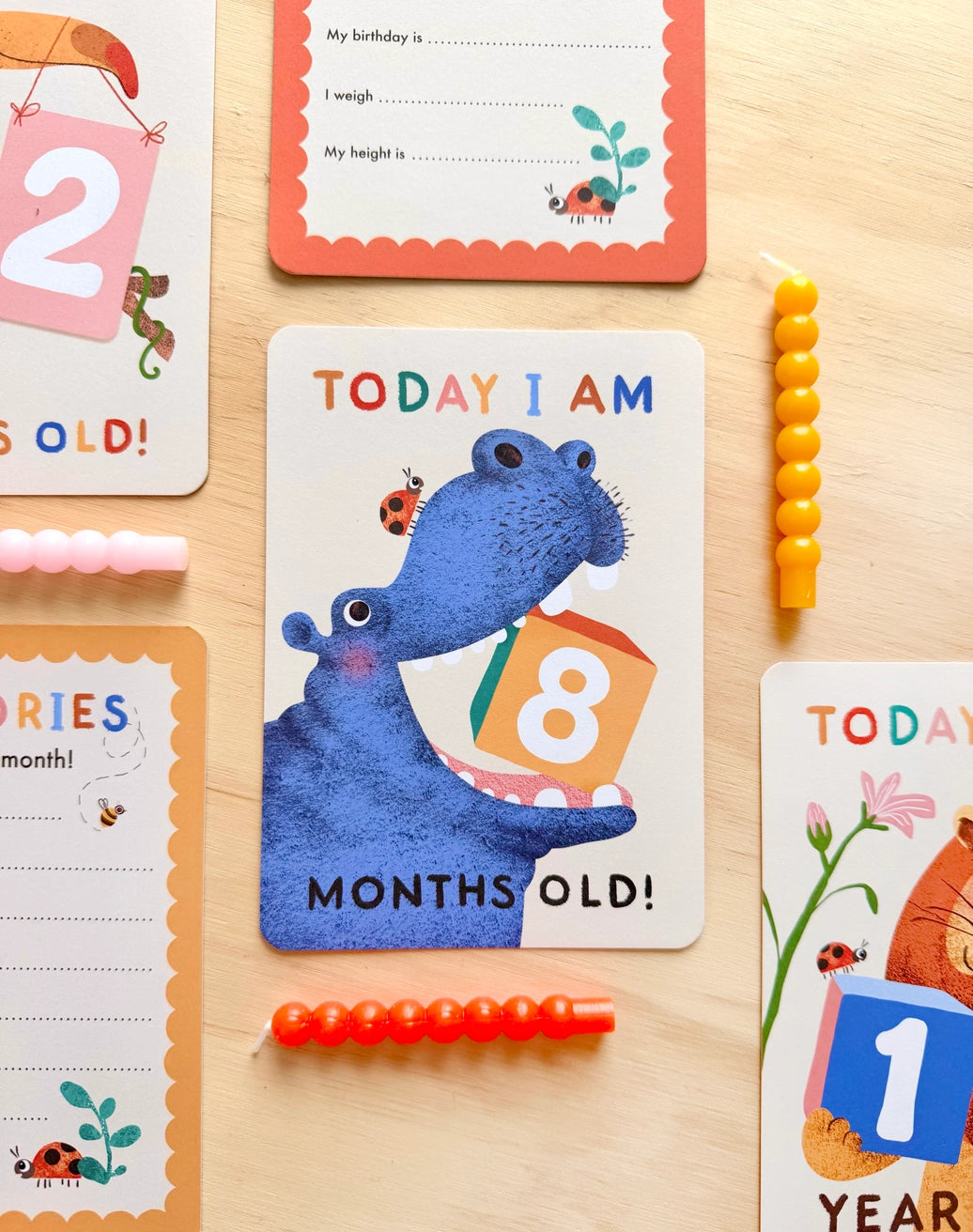 A6 size baby milestone card with rounded corners showing one month old