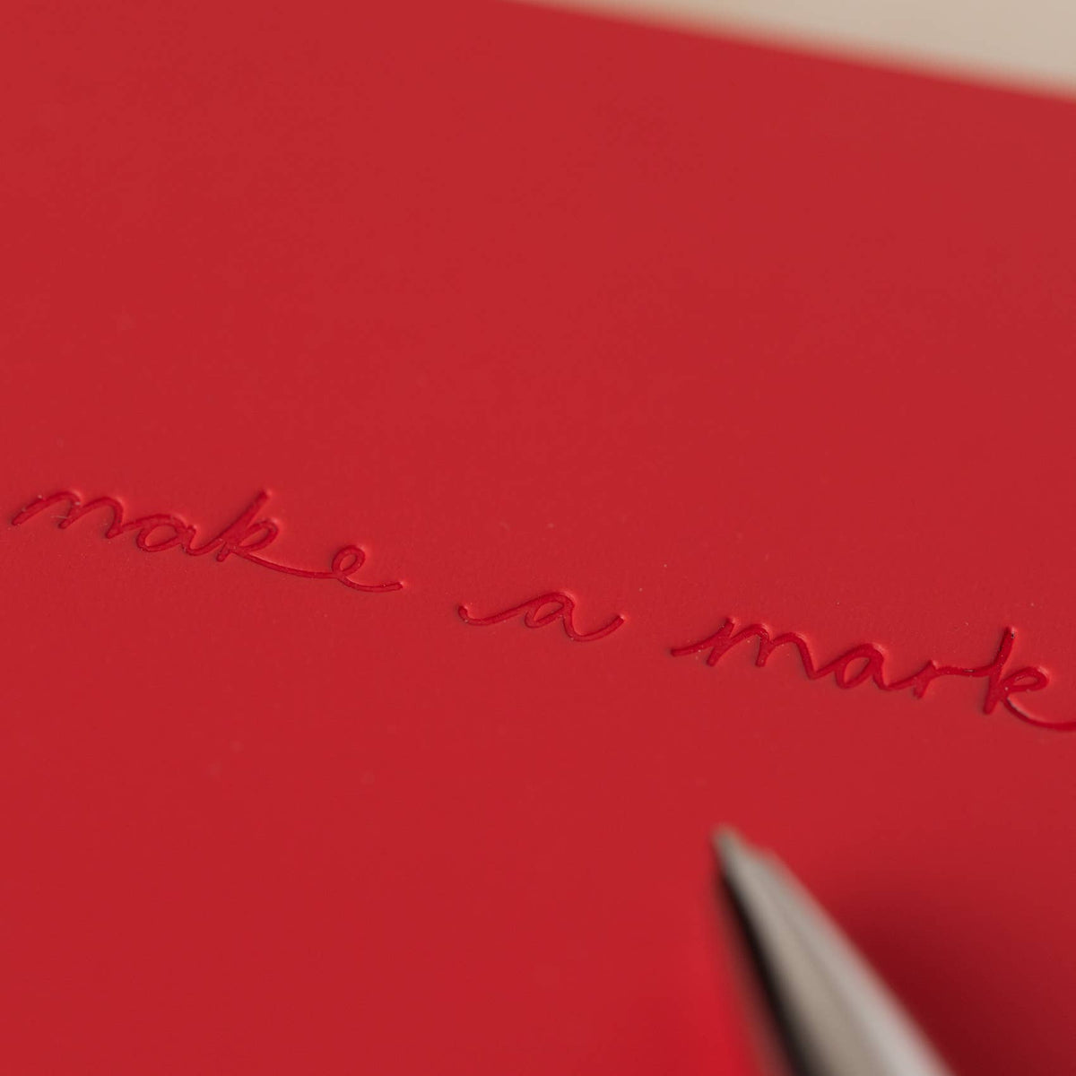 Front cover view of the festive A5 recycled leather notebook