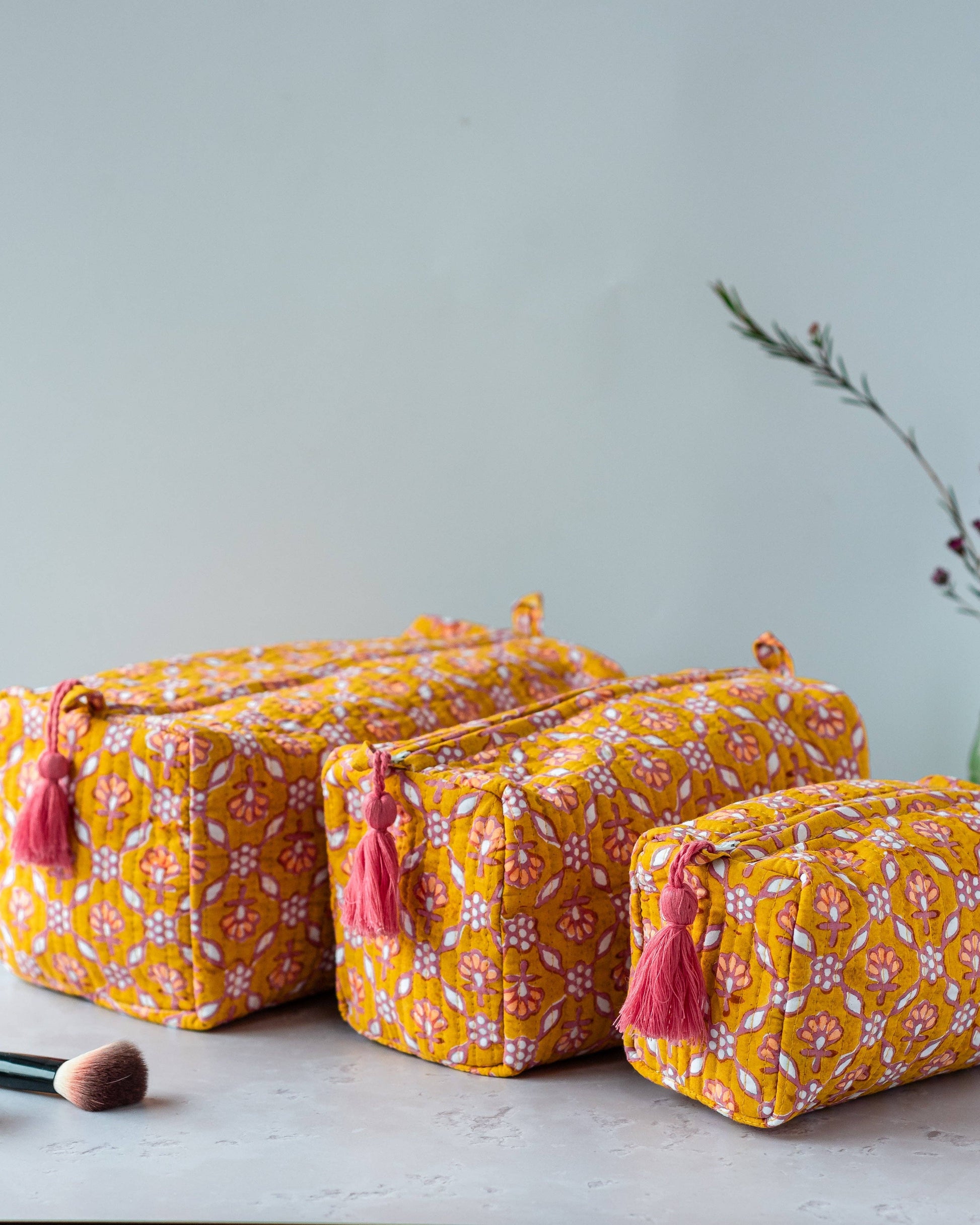 Set of three Nectar Petal block printed wash bags in various sizes