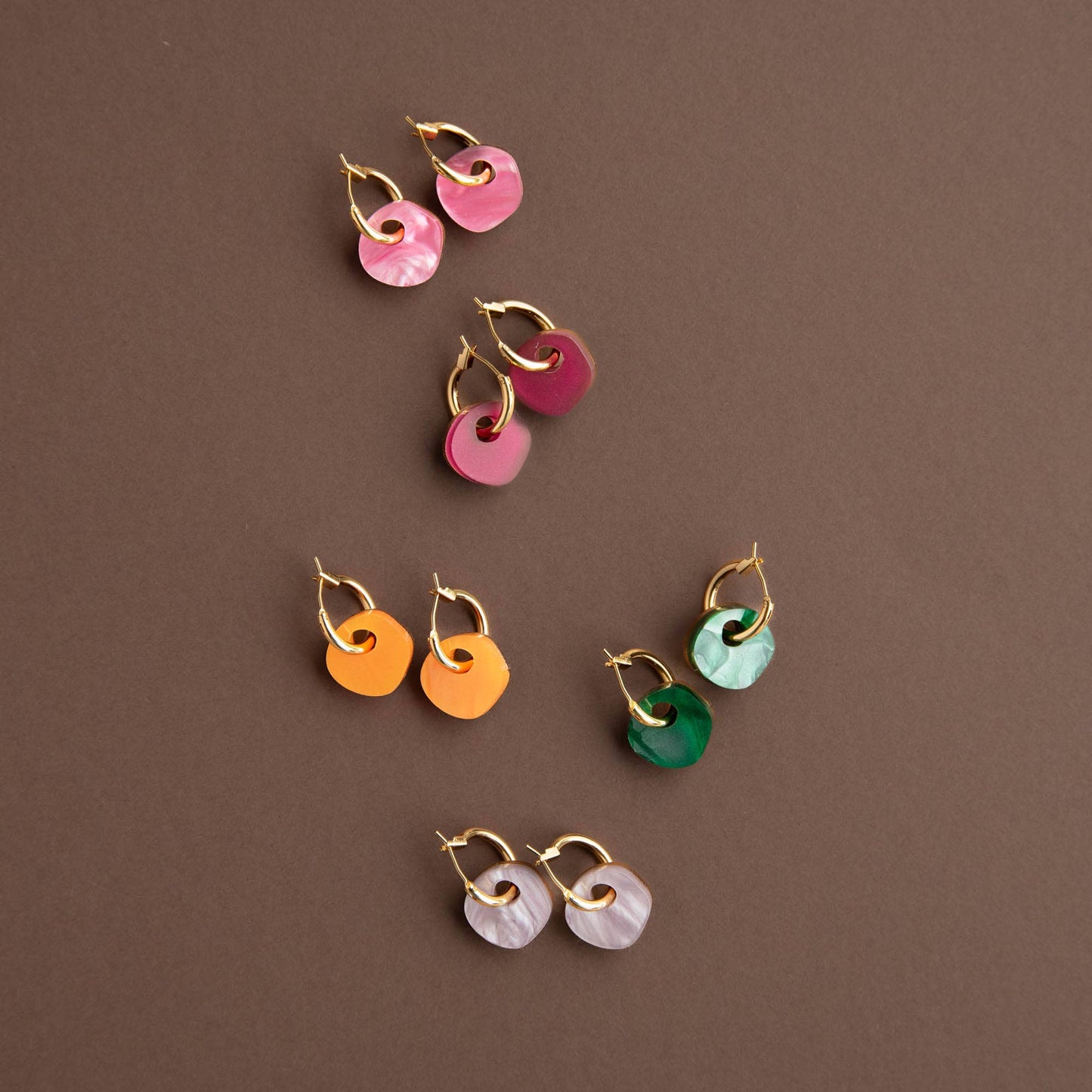 Close up of colourful handmade charms