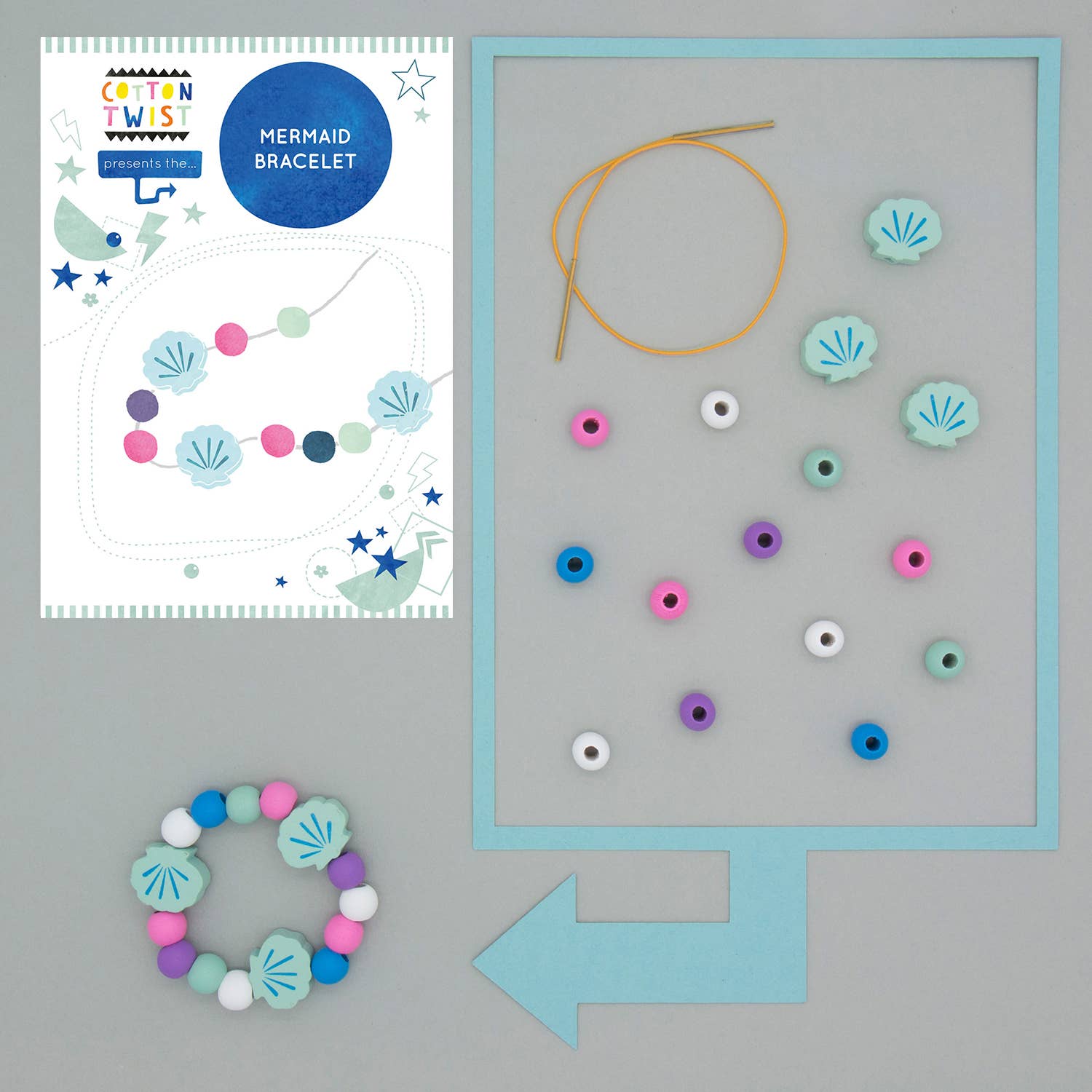 Mermaid bracelet craft kit with materials and instructions on a gray background