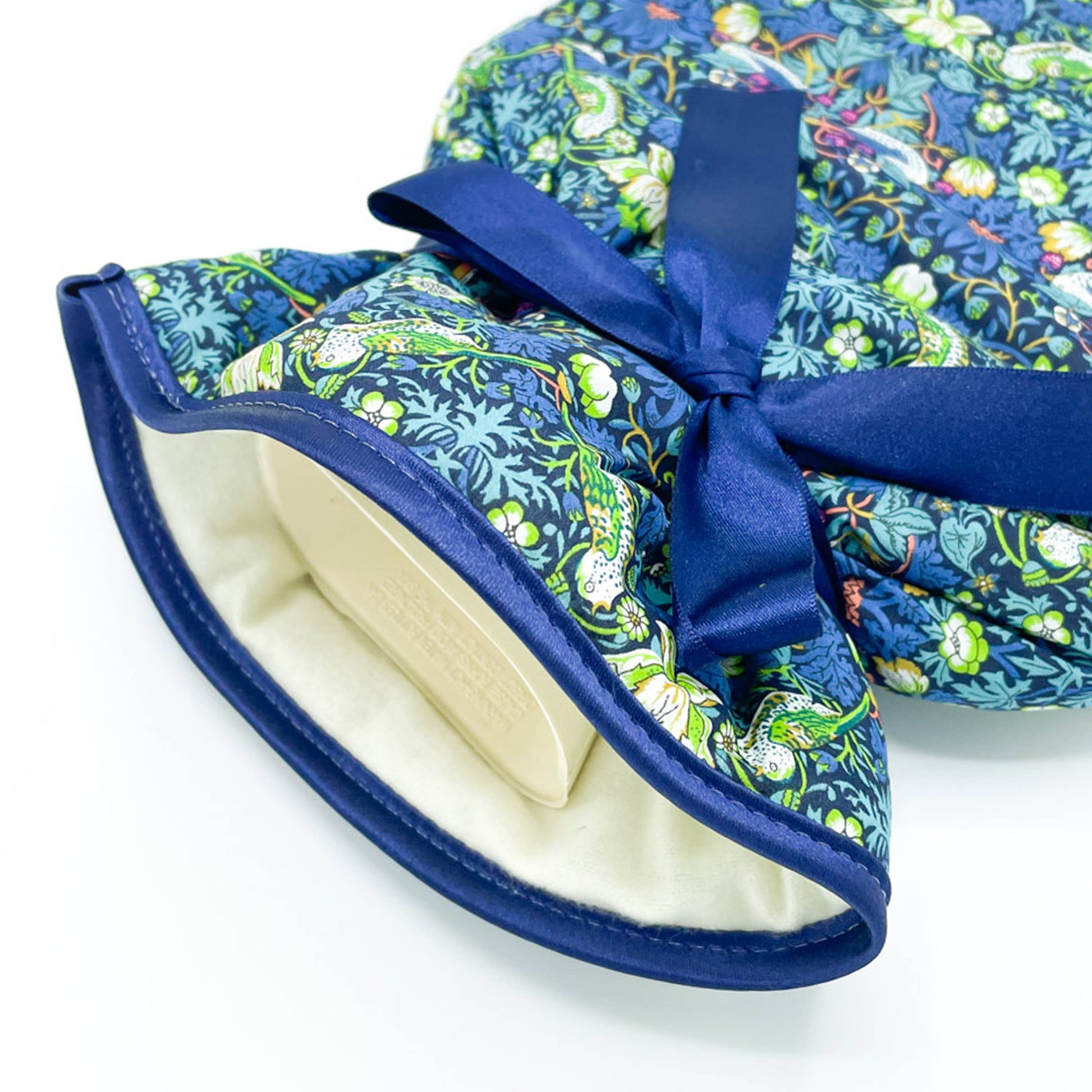 Close-up of Liberty Strawberry Thief Songbird print on hot water bottle cover