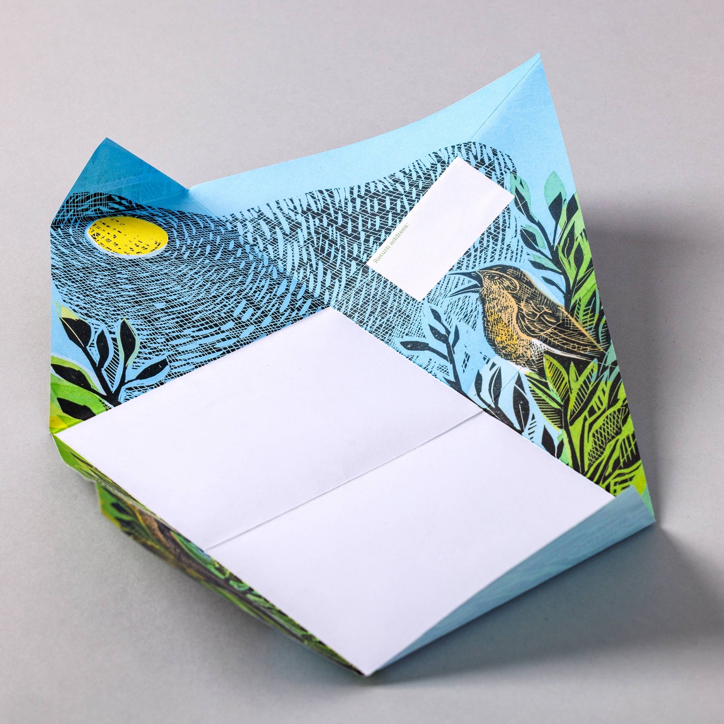 Sustainably Sourced Pigeon Folding Letters Close Up