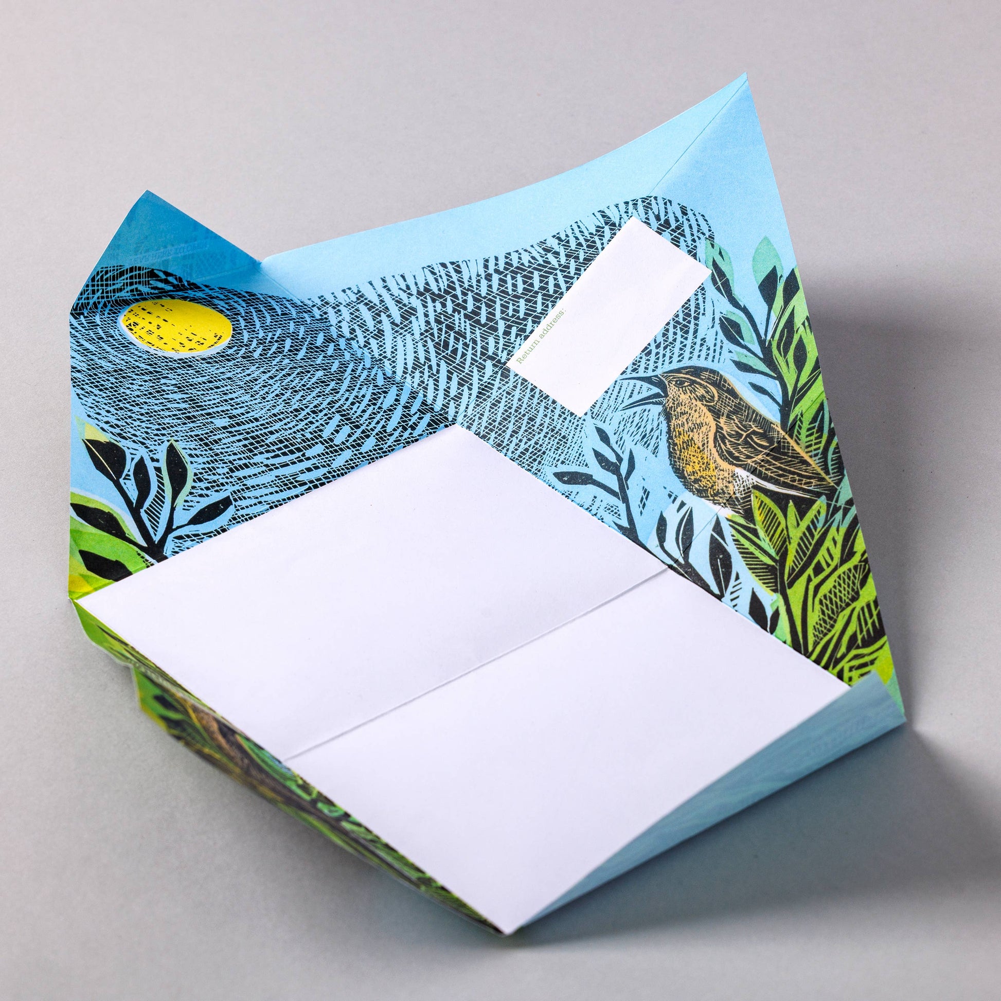 Sustainably Sourced Pigeon Folding Letters Close Up