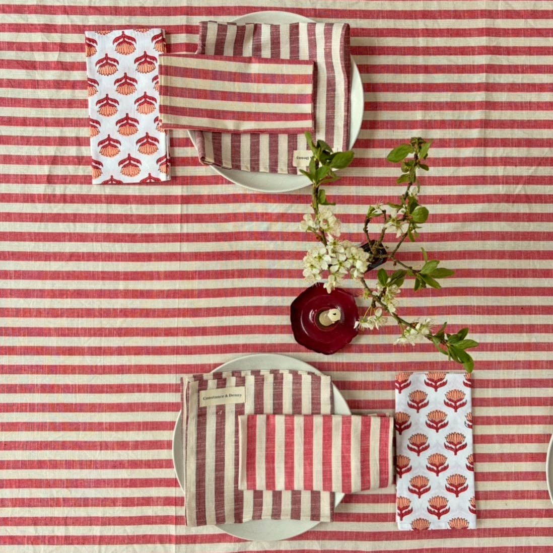 Sustainable cotton napkins folded with eco-friendly tableware