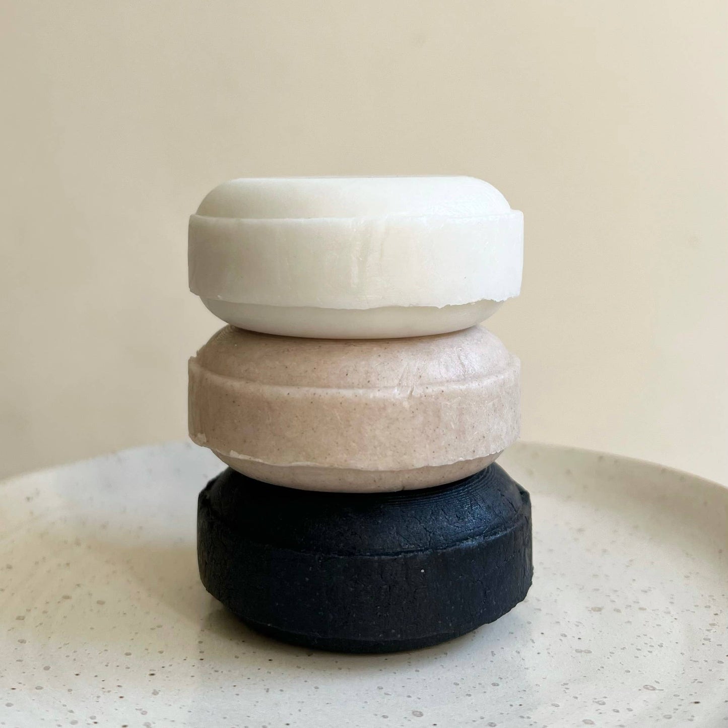 Plastic-free shampoo bar with plant-based ingredients for hair nourishment.