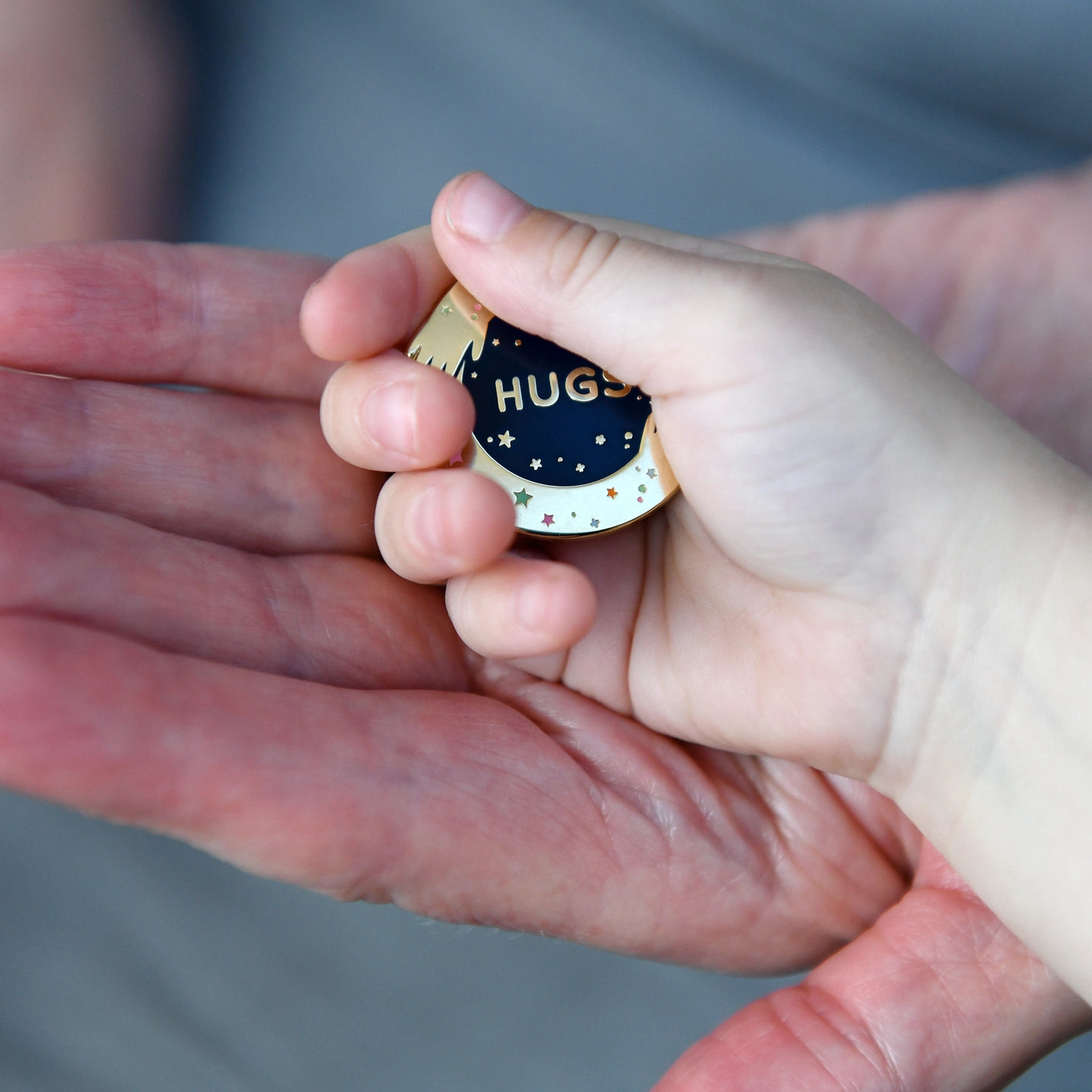 The Clara and Macy Hugs Enamel Pin Badge is a thoughtful, wearable reminder that someone cares—perfect for children and adults alike. Designed to offer comfort during times apart, this pin is especially helpful for little ones coping with separation anxiety, starting school, or missing loved ones at work.