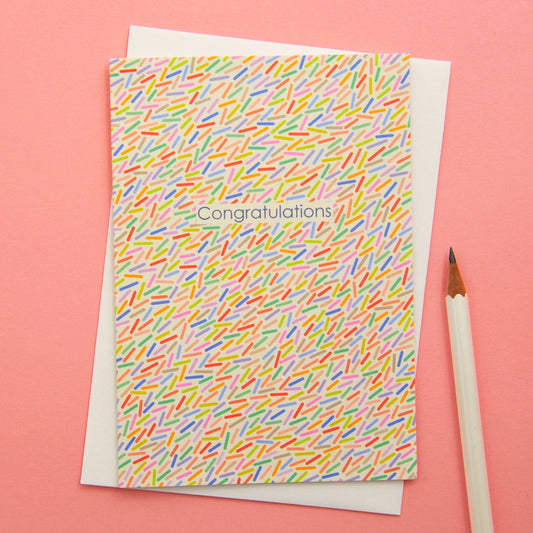 Abstract colourful confetti congratulations greeting card on sustainable 350gsm matt card, with cream envelope and biodegradable sleeve.