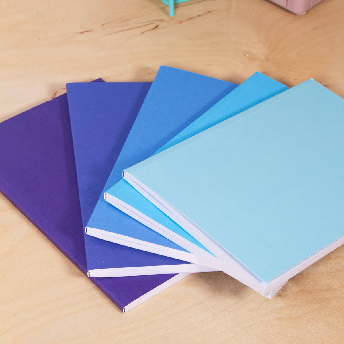 Detailed view of 5mm squared and graph paper in gradient notebook
