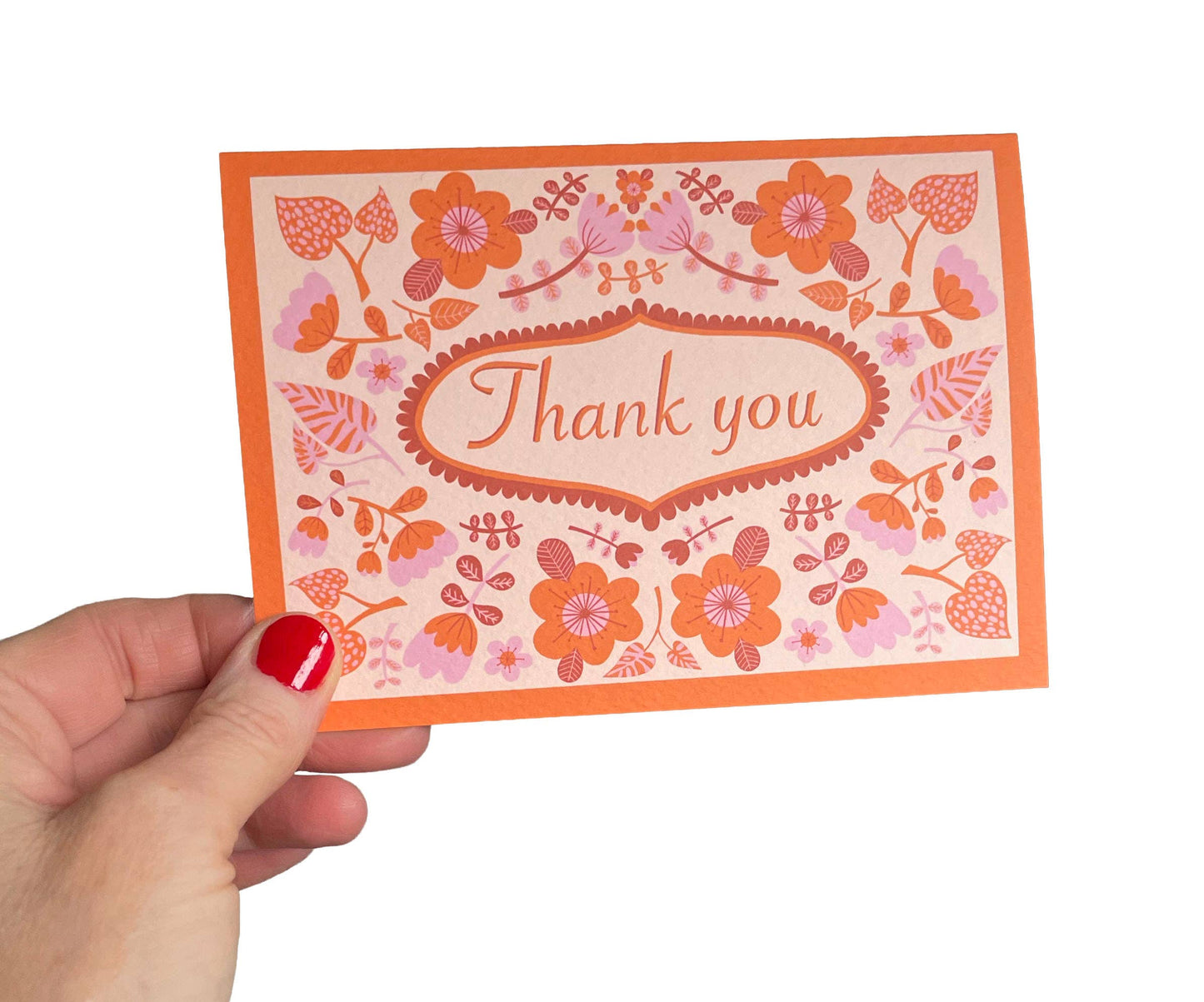 Close up of textured sustainably sourced card with floral design