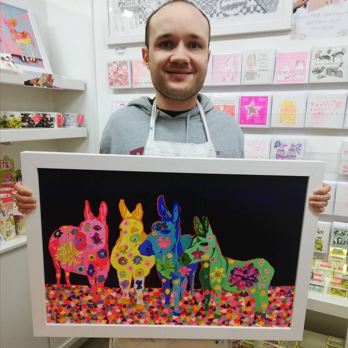 Dusty Road silky dark chocolate bar with marshmallows and biscuit, wrapped in colourful foil featuring Jack Churchyard artwork in a gold frame.