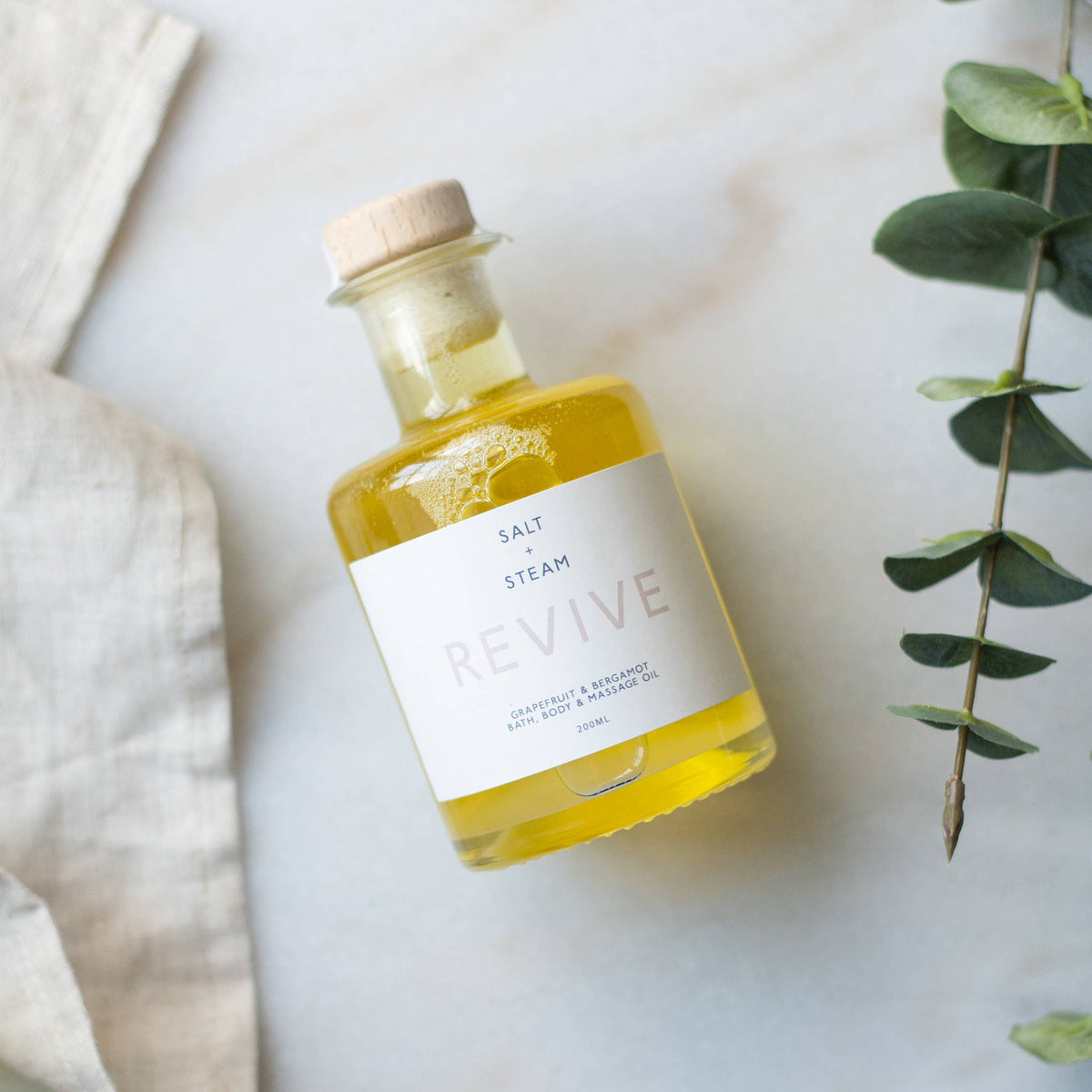 Close up of natural citrus bath and body oil ingredients