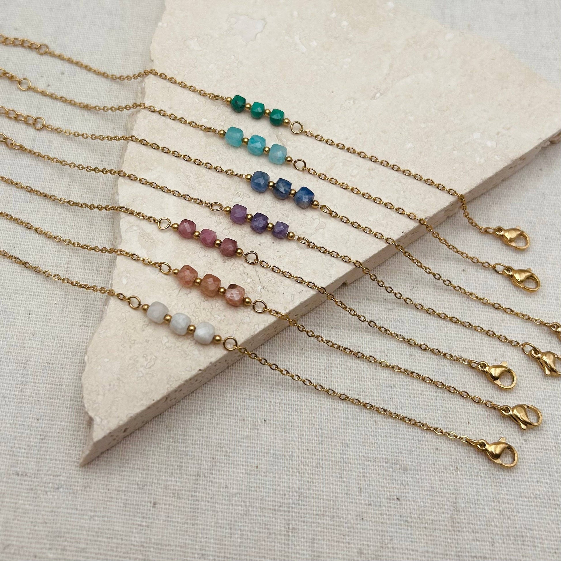 Little Nell lapis trio bead bracelet, gold-plated, waterproof, adjustable chain, and celestial blue lapis lazuli beads
