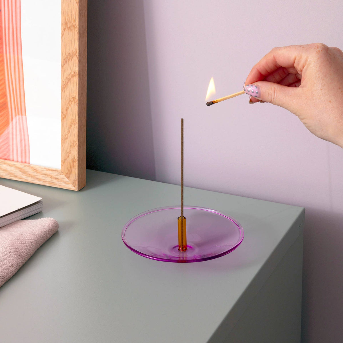 Modern glass incense burner detail and stem