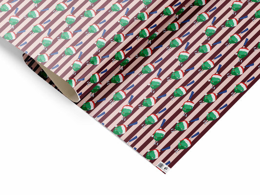 Naughty Sprout Stripes gift wrap with festive sprout in Santa outfit, printed on uncoated recyclable paper.