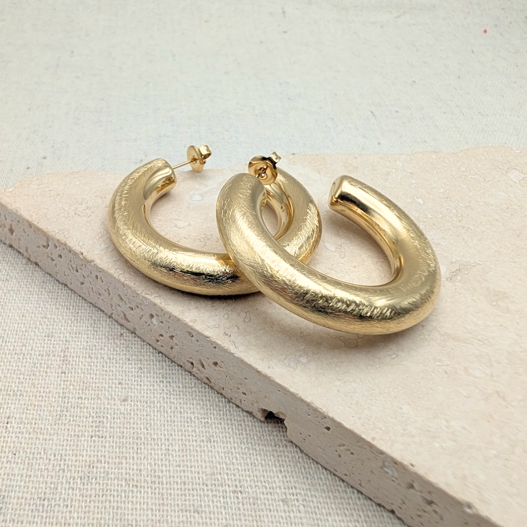 Large gold brushed hoop earrings for everyday wear