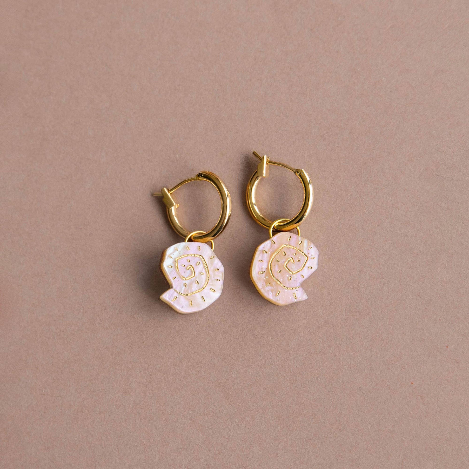 Sustainable wood and acrylic shell earrings from Talay collection