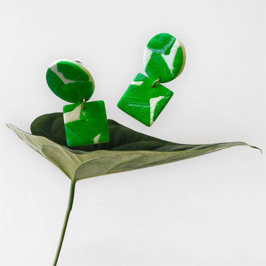Textured green and white polymer clay earrings with botanical design, silver-plated nickel-free hooks, handmade and lightweight, 3.5cm drop.