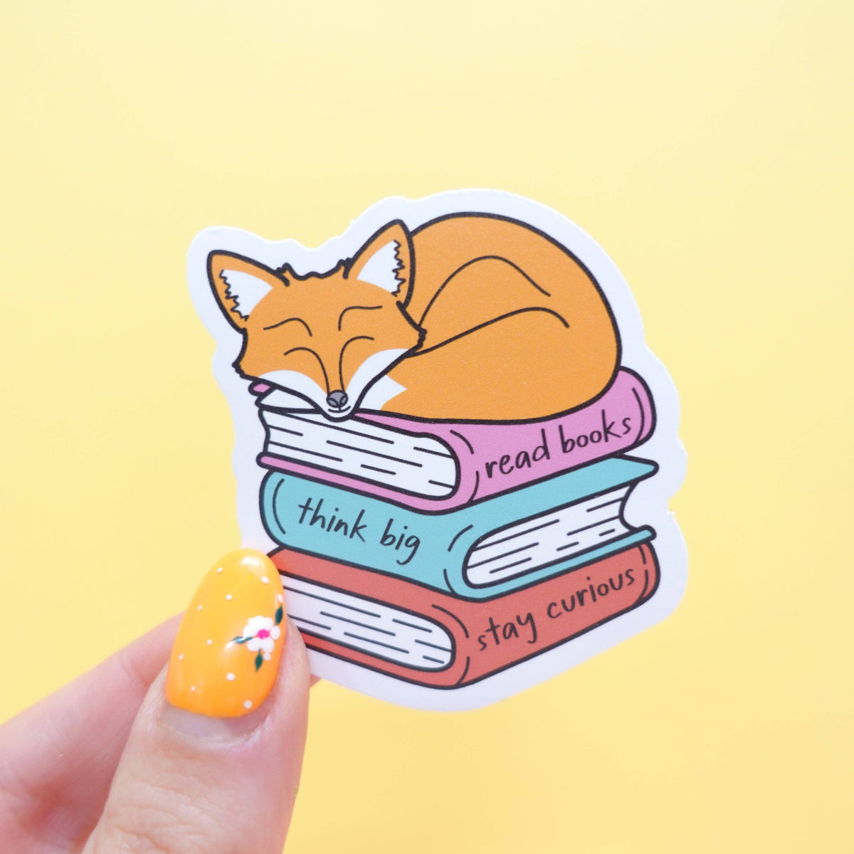 Stay Curious Maple the fox sleeping on books vinyl sticker