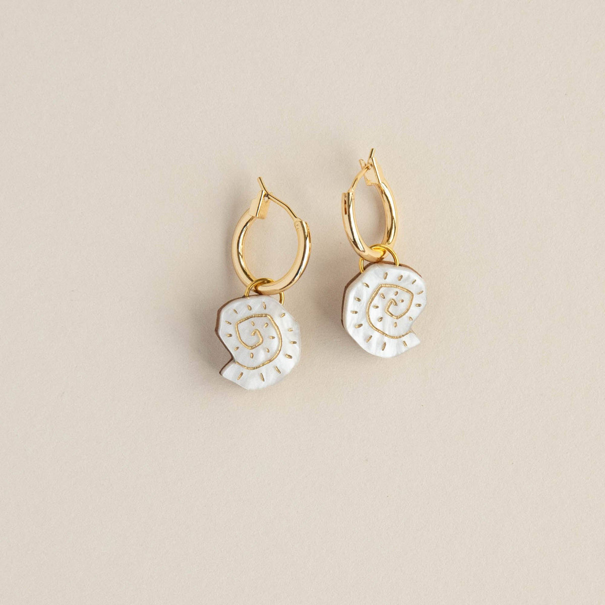 Shell hoop earrings in Pearly White handcrafted from acrylic