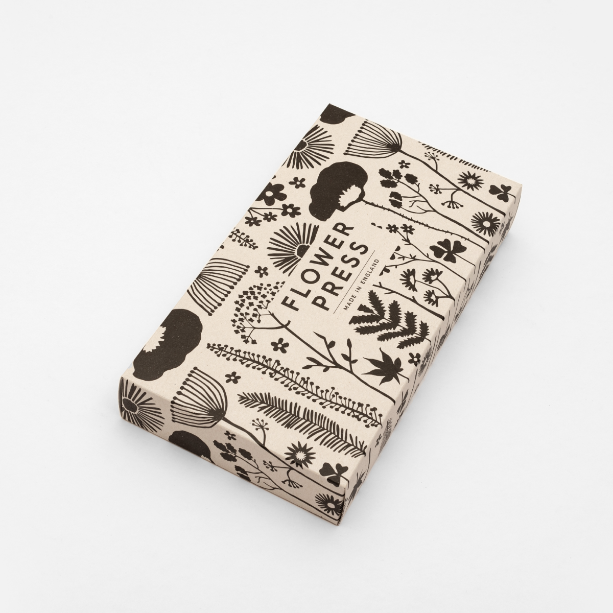 Box for the Flower Press which is monochrome with images of flowers and the words FLOWER PRESS across the centre. All recyclable packaging. 