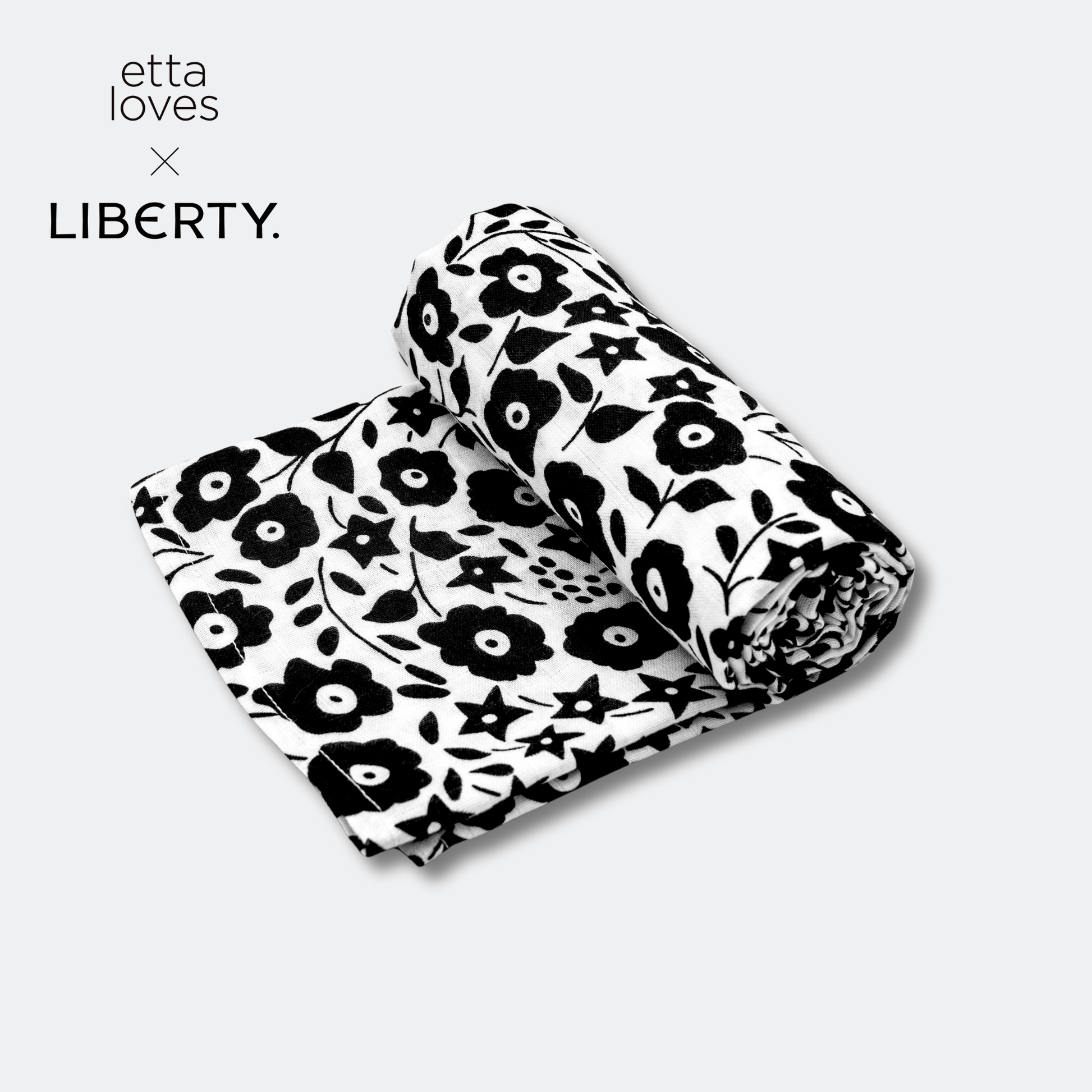 Close up of Liberty Fairford Shadow floral pattern on sensory muslin