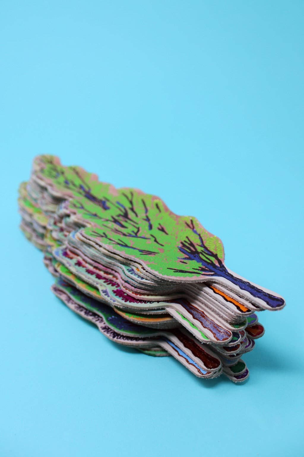 Tree Hugger embossed text on the reverse of the leather bookmark