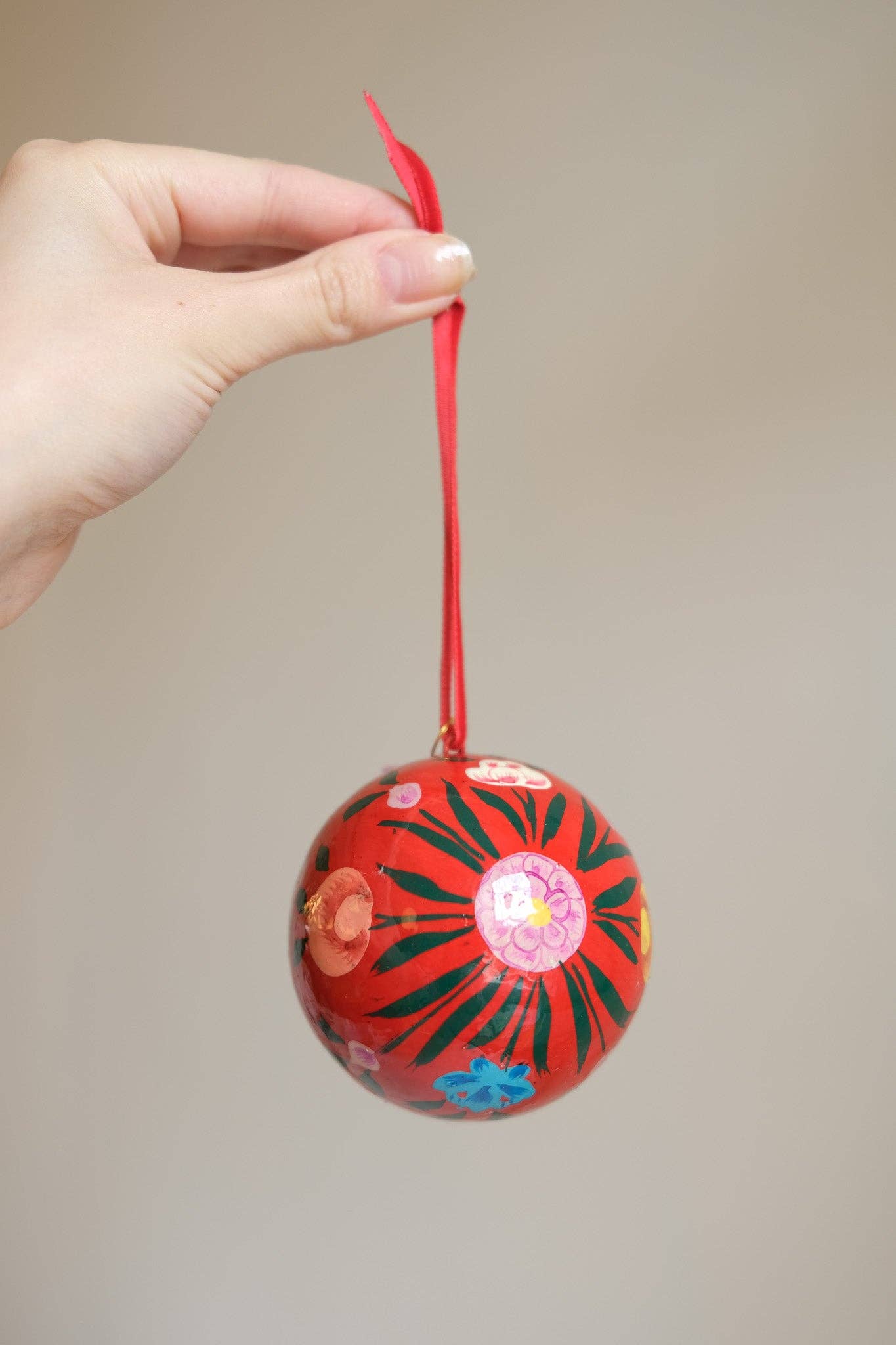 Hand-painted Red Bouquet Bauble by East End Press made from recycled papier mâché with velvet hanging loop