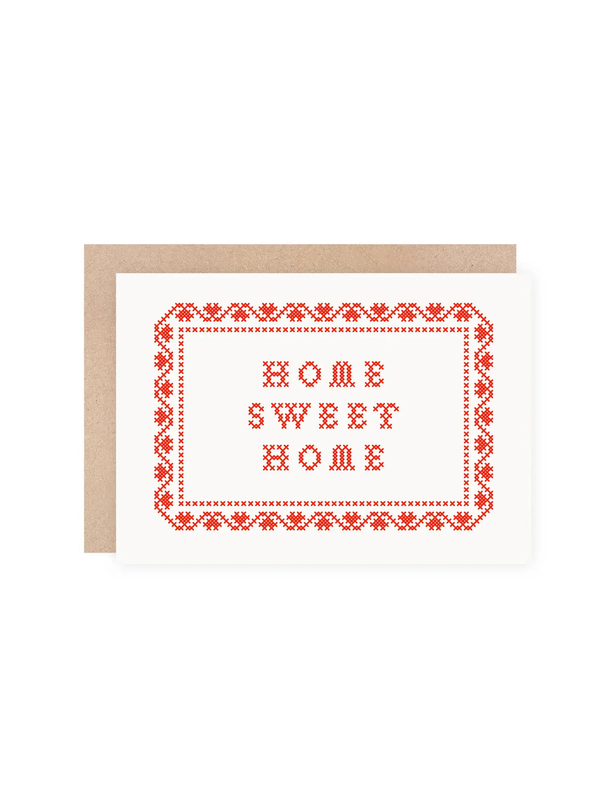 Close up of red screenprinted folk art sampler card