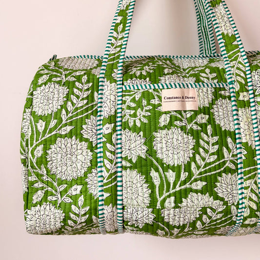 Detailed view of the quilted cotton weekend bag showing striped lining