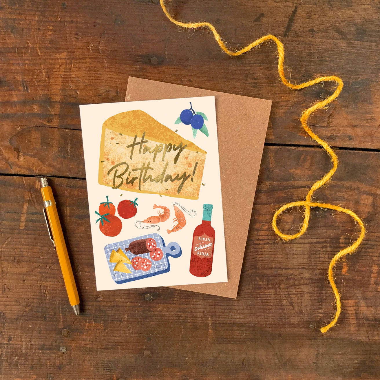 Close up of gold foil detail on tapas birthday card