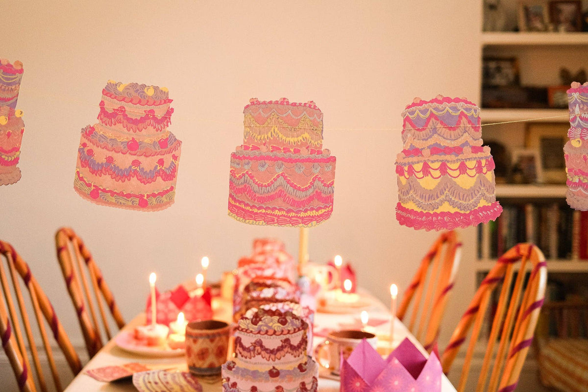 Close-up of sewn stitching on cake paper garland